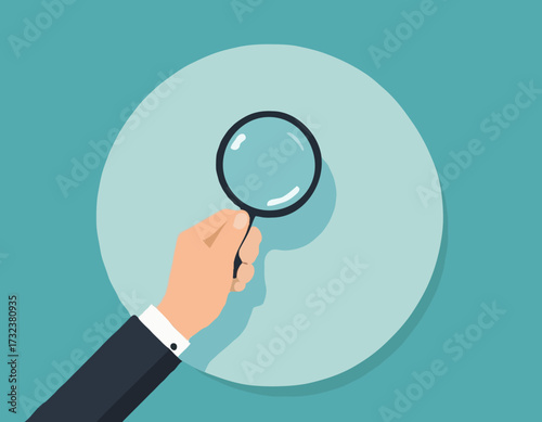 Hands holding magnifying glass for data analysis