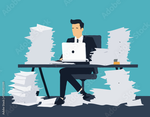 Busy businessman working on computer with pile of papers