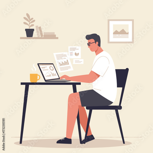 man sitting on a chair with a laptop