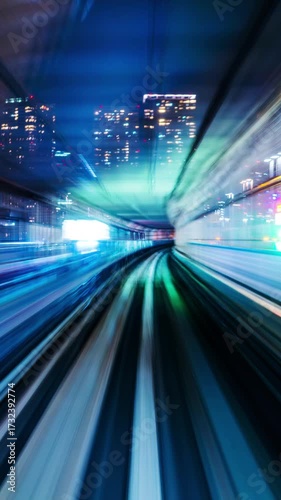 Vertical. Hyperlapse of automatic train moving to tunnel in Tokyo, Japan.