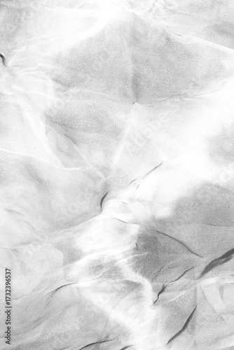 Abstract grunge black and white distressed transparent texture swirly fabric overlay background