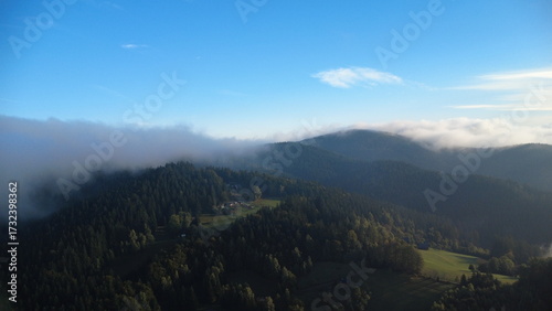 Beautiful view of the Beskydy Mountains in the Czech Republic covered in morning fog, a scenic and tranquil landscape of Bečva valley