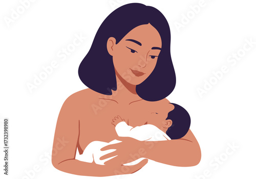 A woman holds a baby in her arms