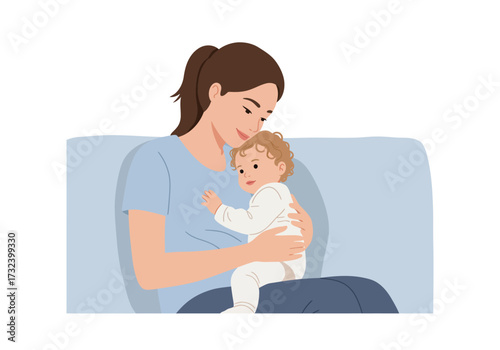 A woman with brown hair in a ponytail holds a curlyhaired baby dressed in white