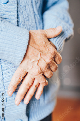 hands of the elderly woman