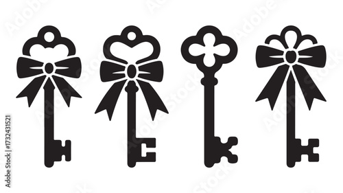 Four ornate antique skeleton keys with decorative bows on a white background vintage