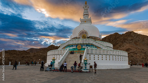 White stupa at Leh, Ladakh on a golden hill — peace meets the Himalayas.