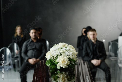 Obraz na plátně Group of middle aged and young adult Caucasian and Black men and women sitting i