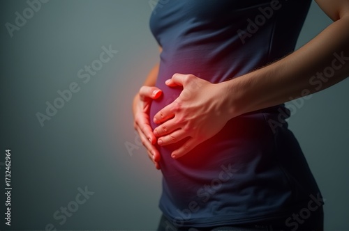 In a calm, intimate setting, a person's hands cradle their baby bump with love and hope. This tender moment captures the beauty of pregnancy and the excitement for new life