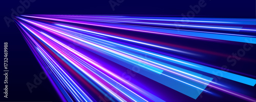 A rush of glowing lines mimics the motion of data traveling through a digital highway. Bright neon stripes evoke speed, energy, and futuristic design. The light blurs enhance depth.