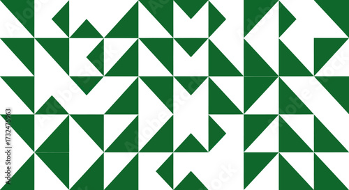 Green-white geometric tessellation made of triangular, arrow-like shapes
