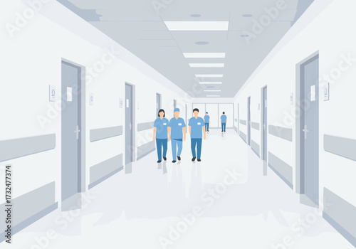 Healthcare workers walking in hospital corridor medical environment professional setting front view teamwork concept