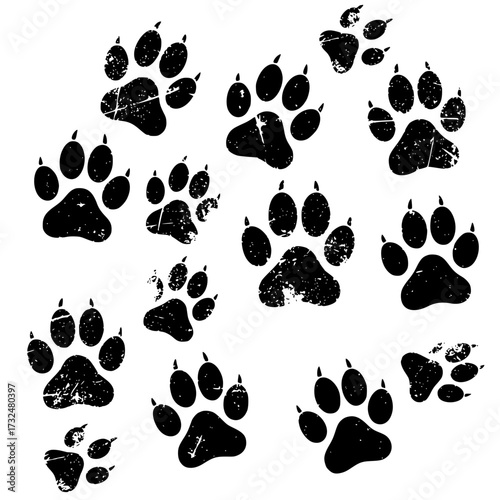 Vector art of black paw prints collection with various sizes and orientations