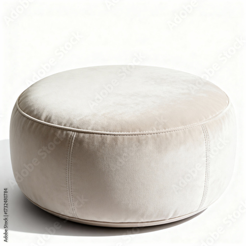 Round soft pouffe stool with cushioned fabric isolated on white background