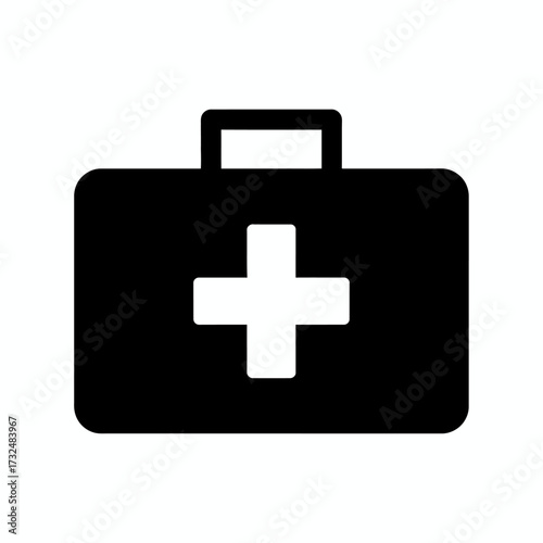 First aid kit or medical bag glyph icon. A black briefcase symbol with a white cross for emergency healthcare.