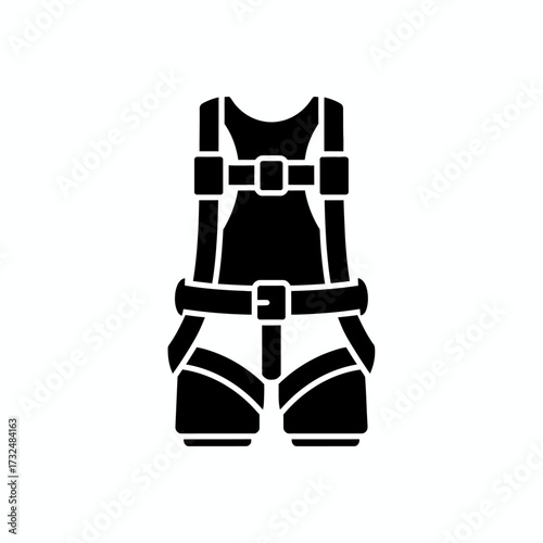 Black solid glyph icon of a safety harness. A symbol for fall arrest and personal protective equipment (PPE).