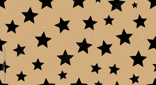 Tan backdrop with many black stars of varying sizes scattered around