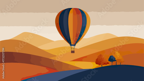 Hot air balloon over autumnal hills