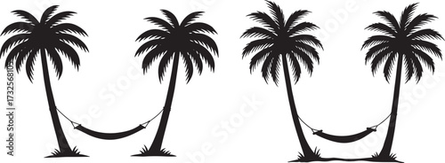 Two palm trees with hammocks between them silhouette