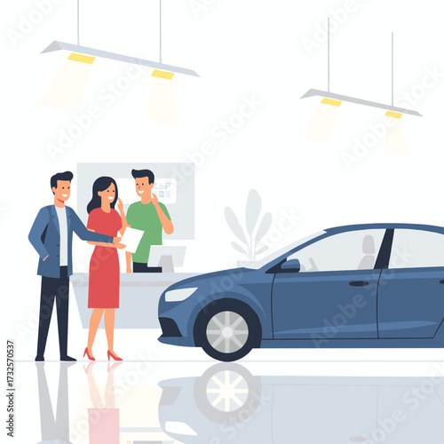 A car salesperson goes over the sales contract with a couple purchasing a vehicle