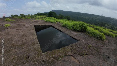 Engineering of the Ancients: Detailed View of a Carved Water Reservoir Used for Monastic Drinking Supply at the Historic Kanheri Caves Complex, Mumbai, India 