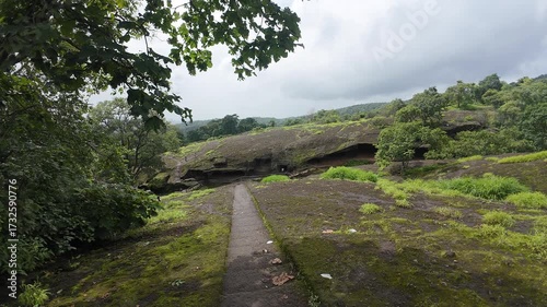 A Wide, Scenic Landscape Showing the Basalt Rock Outcrops and Verdant Nature Environs of the Ancient Kanheri Caves in Mumbai, Maharashtra