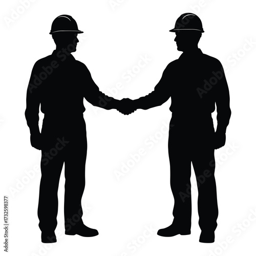 Two silhouetted construction workers firmly shaking hands demonstrating partnership and agreement in the building industry silhouette