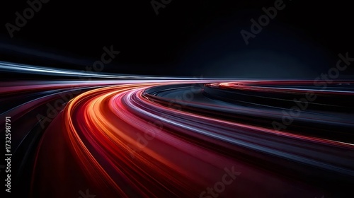 赤い光跡が特徴的な抽象的な道路の夜景