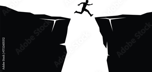 Silhouette of man jumping across cliff gap, symbolizing risk, challenge, courage, success, motivation, determination, achievement, goal, and ambition