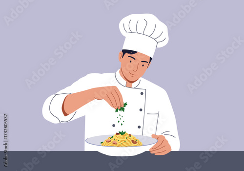 Chef preparing delicious pasta dish in kitchen culinary indoor setting focus on garnishing