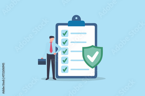 Businessman with checklist and shield symbolizing security and approved tasks