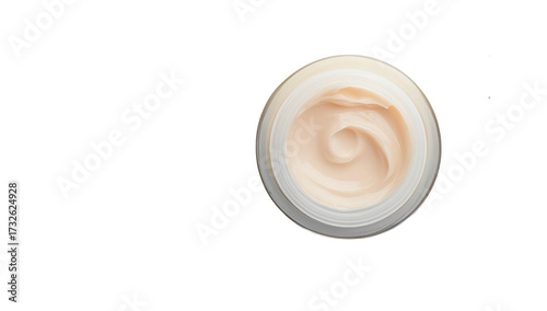 A close-up view of a creamy skincare product in a glass jar. its smooth texture against a clean white background with subtle glitter accents. ideal for beauty and wellness marketing