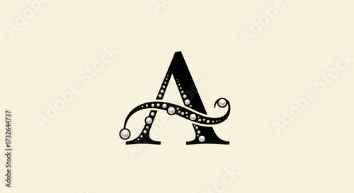 Ornate letter A with pearl accents