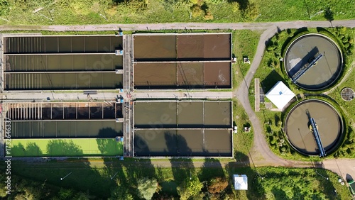 Aerial View of a Modern Wastewater Treatment Plant with Circular and Rectangular Clarifier Tanks