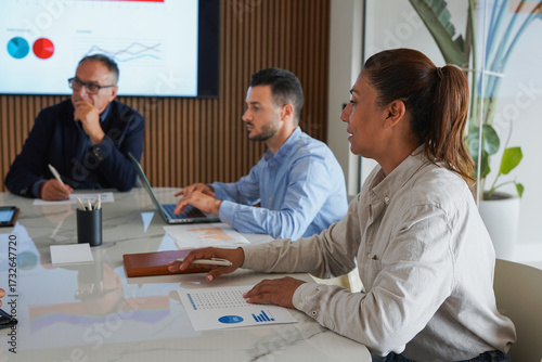 Multi generational business people working together inside modern office sharing ideas - Brainstorm, colleagues and entrepreneur concept