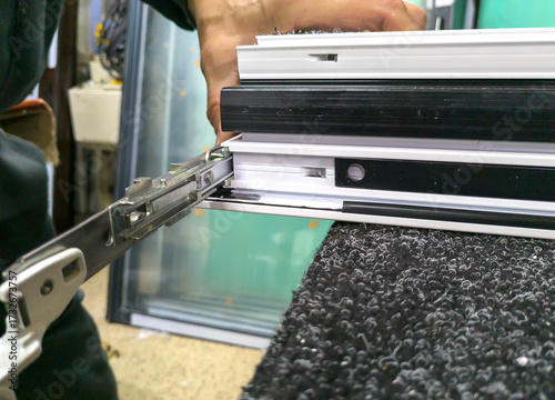 Installation of a tilt mechanism on an aluminum window sash