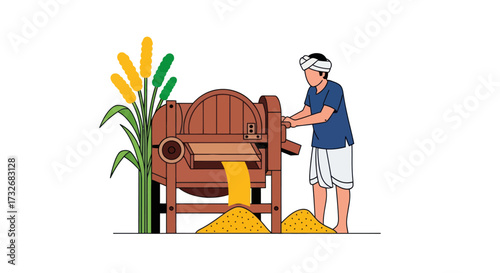 Indian farmer using a traditional wooden corn thresher machine.