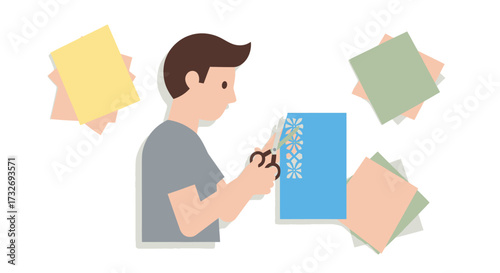 Man cutting blue paper with scissors for a craft project.