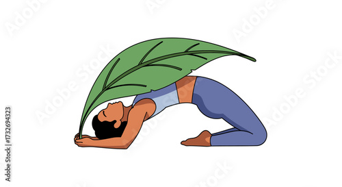 Woman in a yoga backbend pose holding a large green leaf.