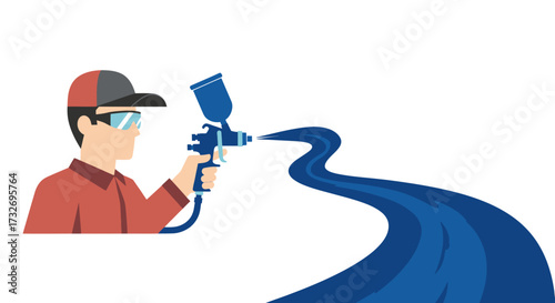 Industrial painter with safety gear using a spray gun.