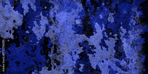Deep royal blue and light grey distressed grunge texture with dark shadows and rough weathered surface patterns
