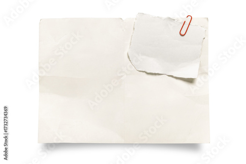 Torn white paper note clipped with a red paperclip on large blank sheet, isolated on white for mockup, message, reminder, planner or design template