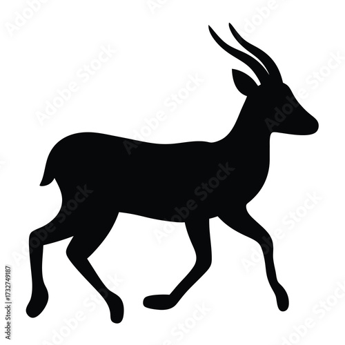 Elegant silhouette of an Antelope or Gazelle gracefully walking in black