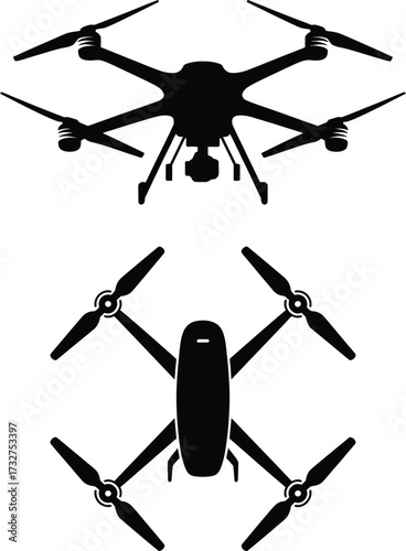 Two black silhouette drones flying overhead aerial photography unmanned aircraft quadcopters