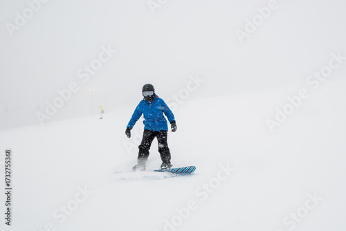 young woman with snowboard