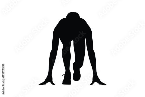 Runner in starting blocks silhouette ready to sprint
