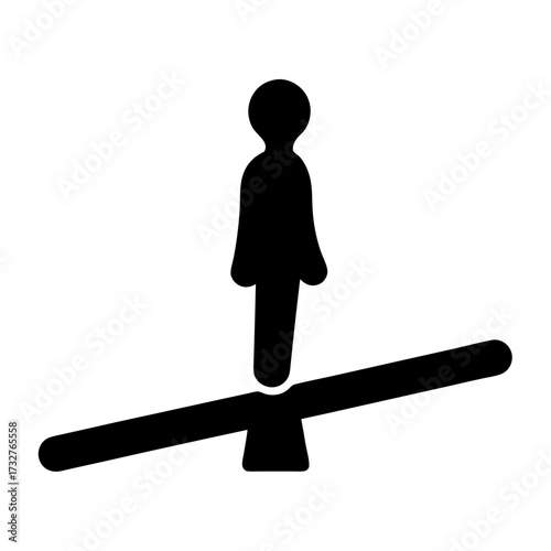 Black silhouette of person standing on a seesaw showing balance and play