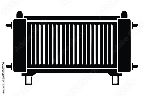 Black radiator has a segmented metal panel and is resting on stubby feet