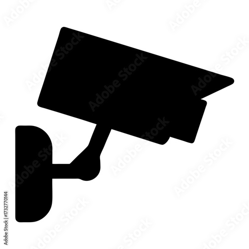 Silhouette of security camera mounted on wall for surveillance purposes in black