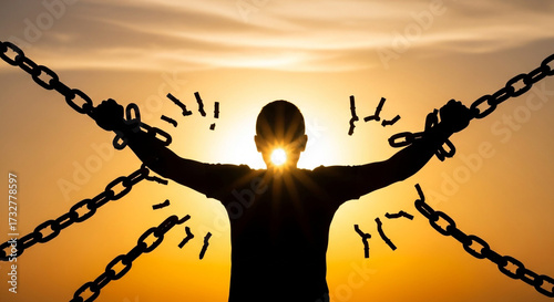 Powerful silhouette of a person breaking free from chains against a vibrant sunset, symbolizing liberation and new beginnings